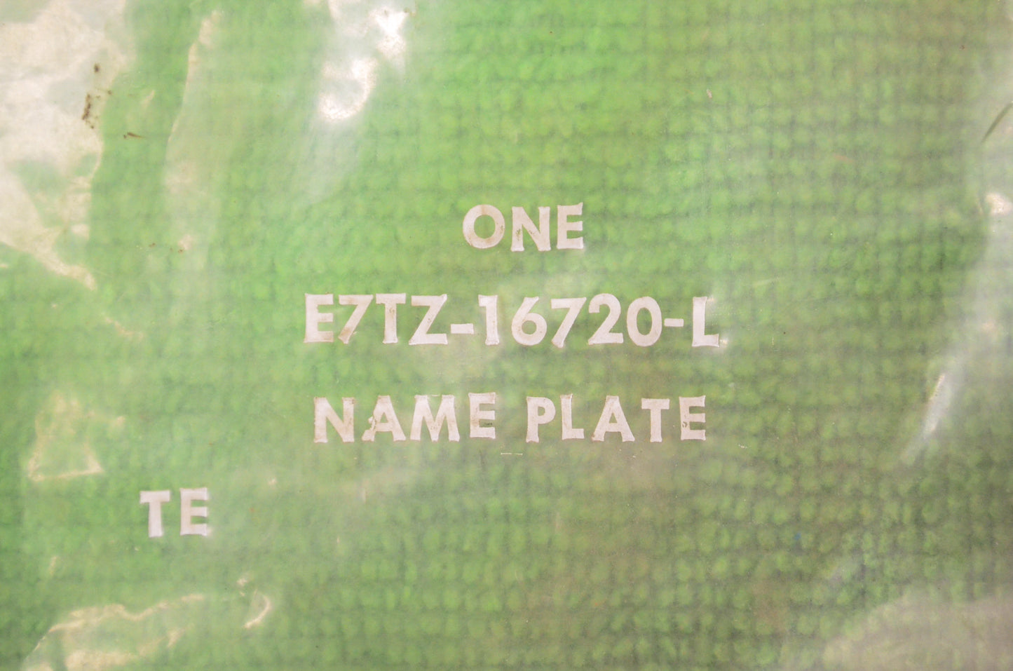 New OEM Ford E7TZ16720L 4x4 Logo Plate NOS