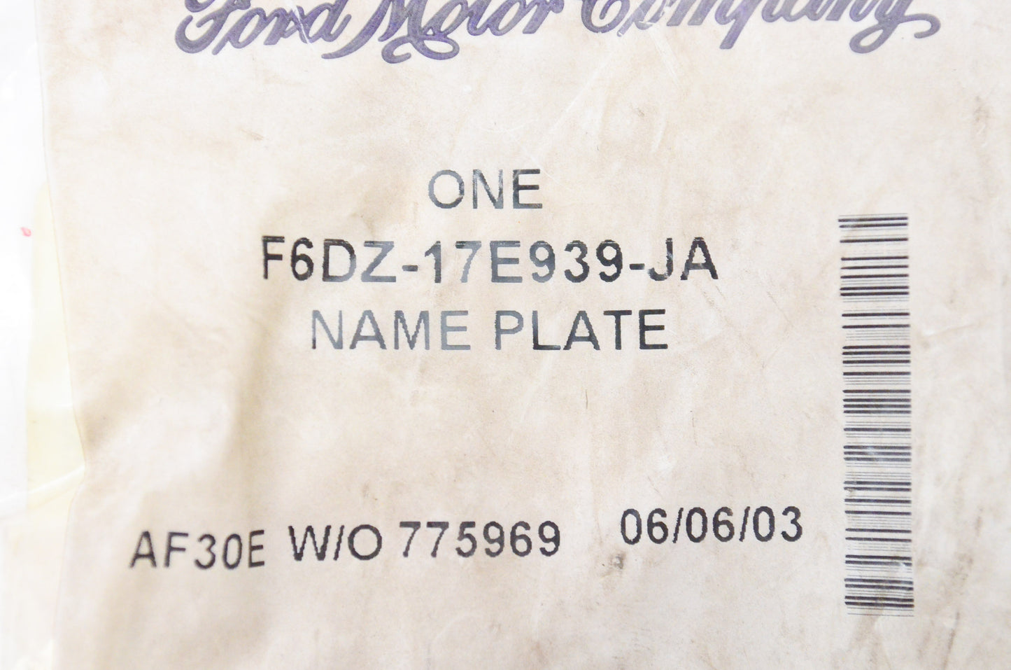 New OEM Ford F6DZ17E939JA Rear Bumper Taurus Name Plate NOS