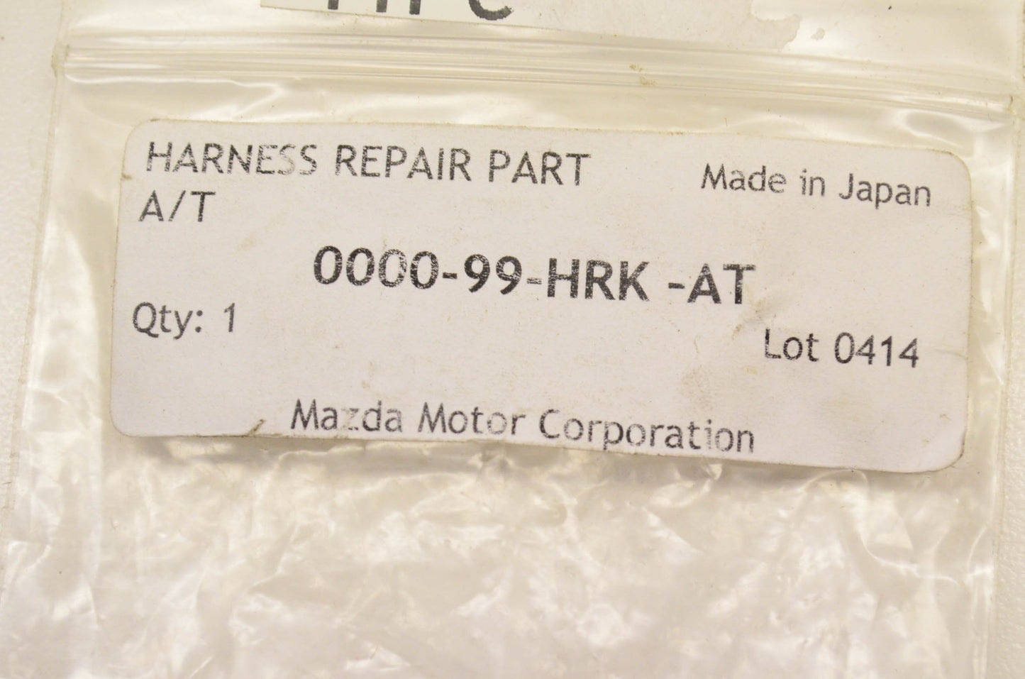 New OEM Mazda 0000-99-HRK-AT Harness Repair Part NOS