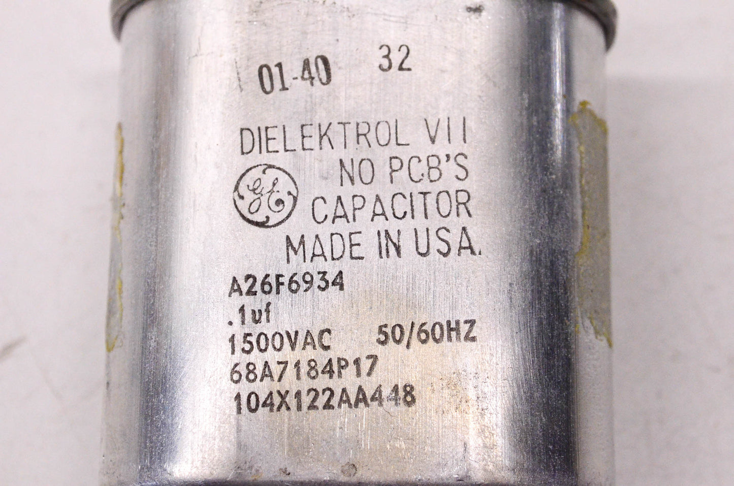 General Electric .1uF 1500 Volt AC 50/60HZ Capacitor W/ Hold Down Clamps NOS