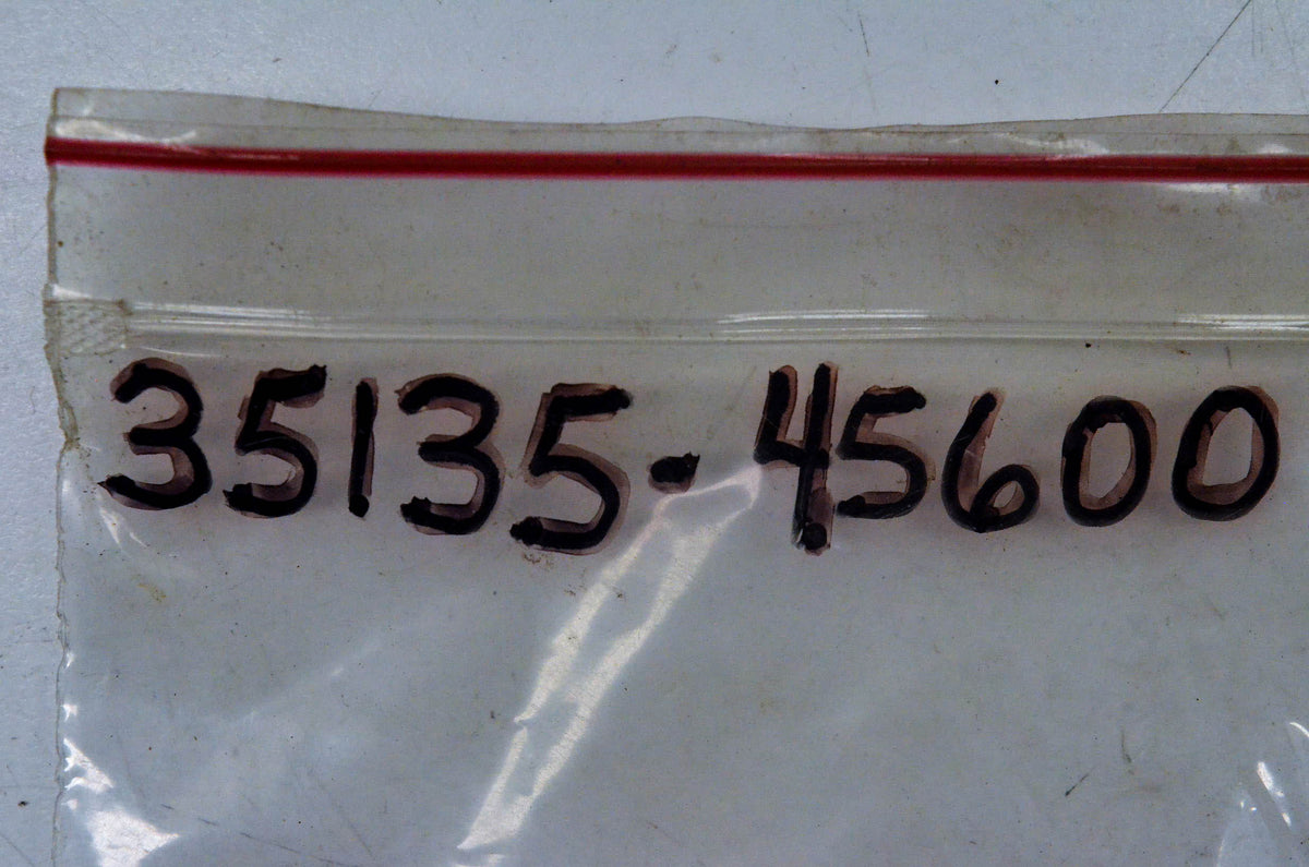 New OEM Suzuki 35135-45600 Head Lamp Nut NOS