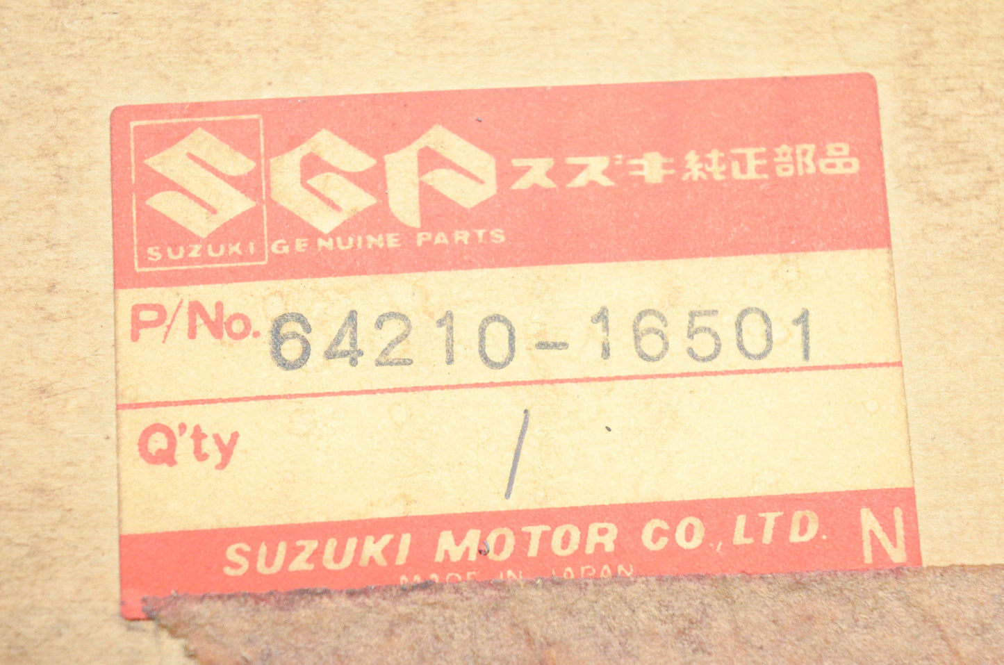New OEM Suzuki 64210-16501 Rear Brake Plate NOS