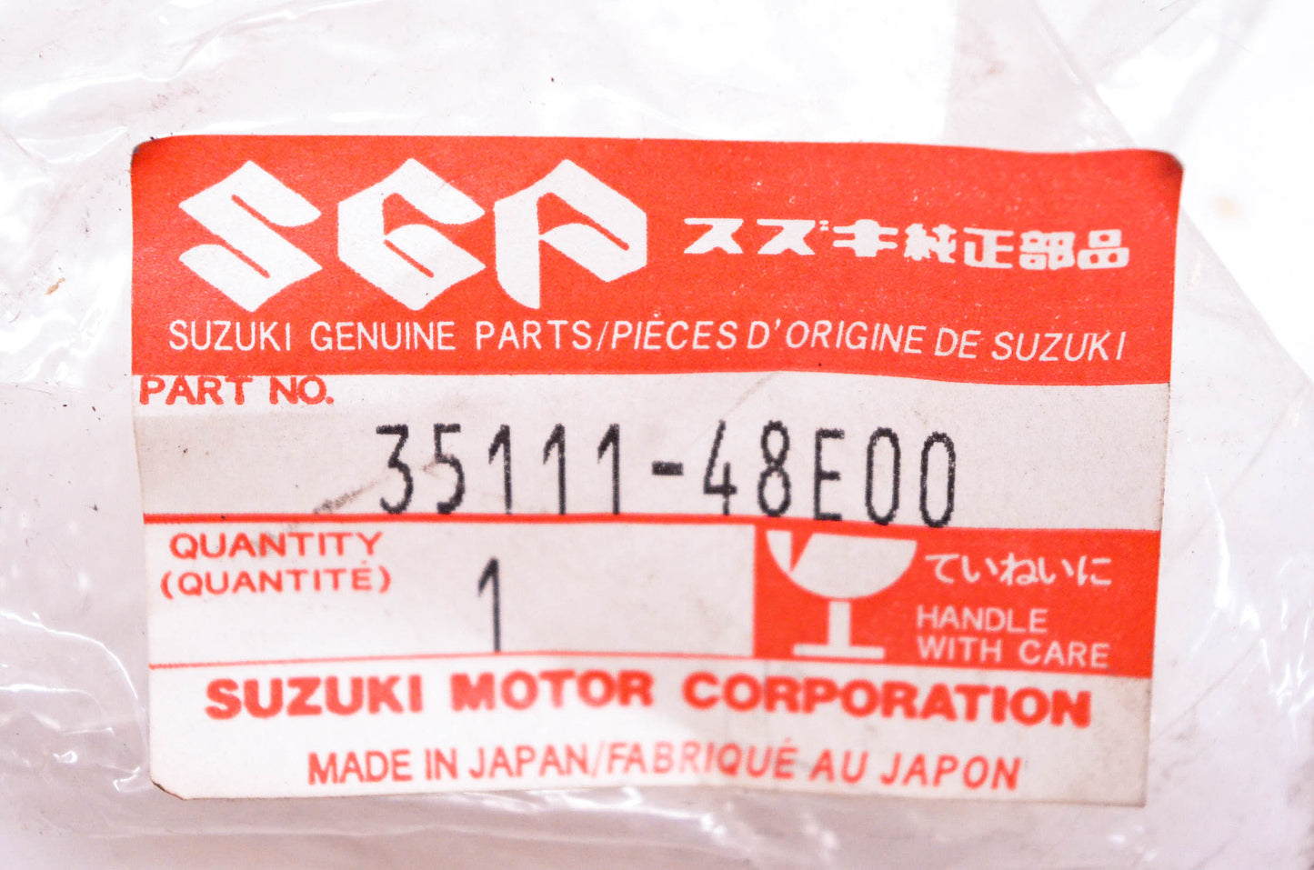New OEM Suzuki 35111-48E00 Headlight Rim NOS