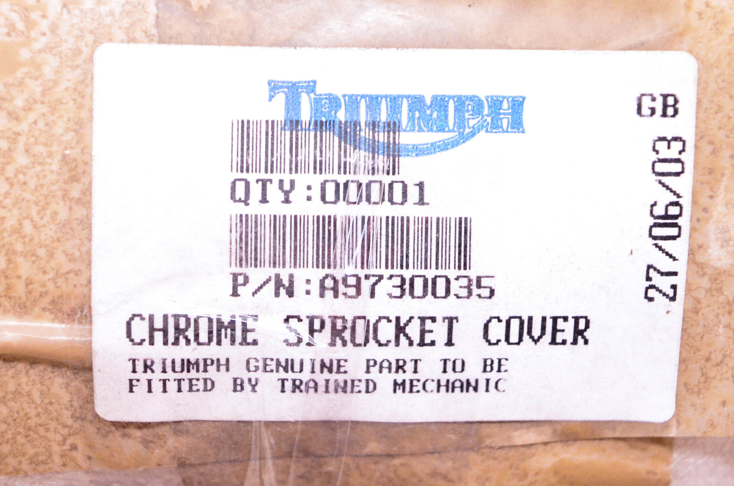 New OEM Triumph A9730035, 1261650 Chrome Sprocket Cover NOS