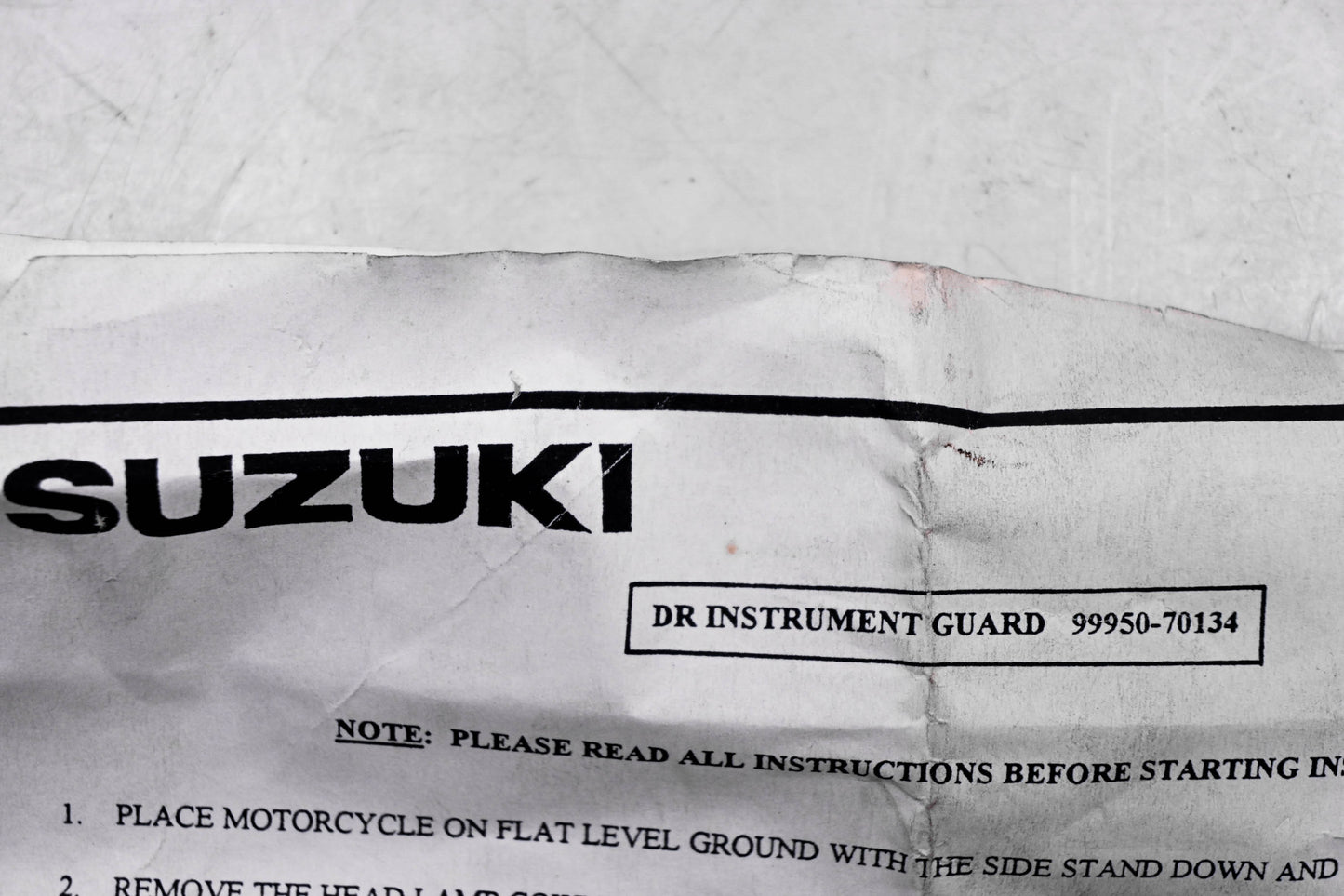 New OEM Suzuki 99950-70134 DR Instrument Guard NOS
