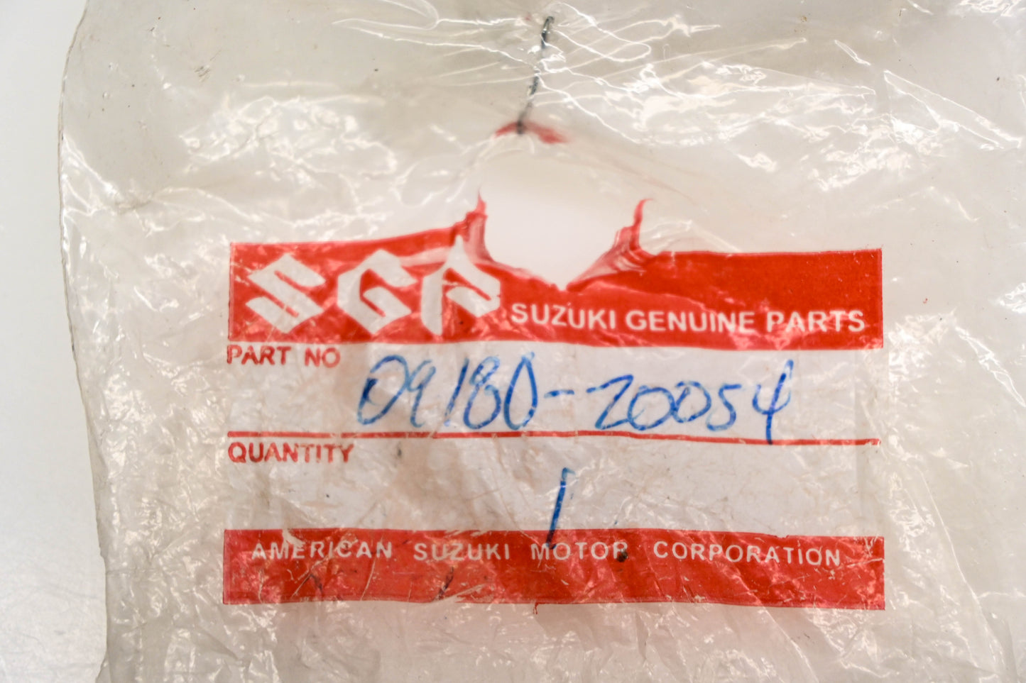 New OEM Suzuki 09180-20054 Rear Left Axle Spacer NOS