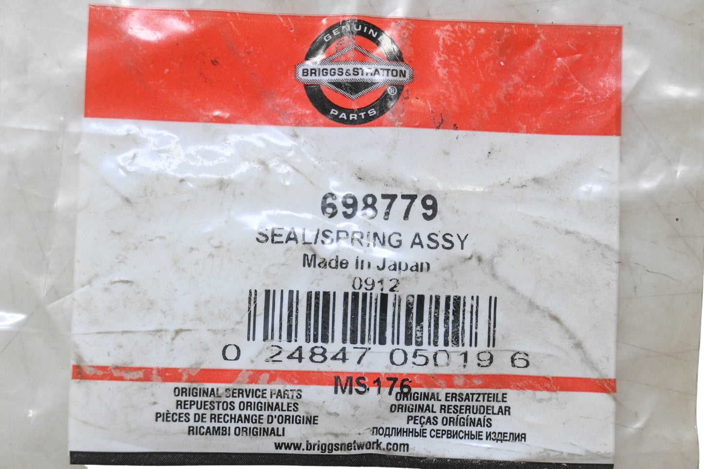 New OEM Briggs & Stratton 698779 Seal Spring Assembly NOS
