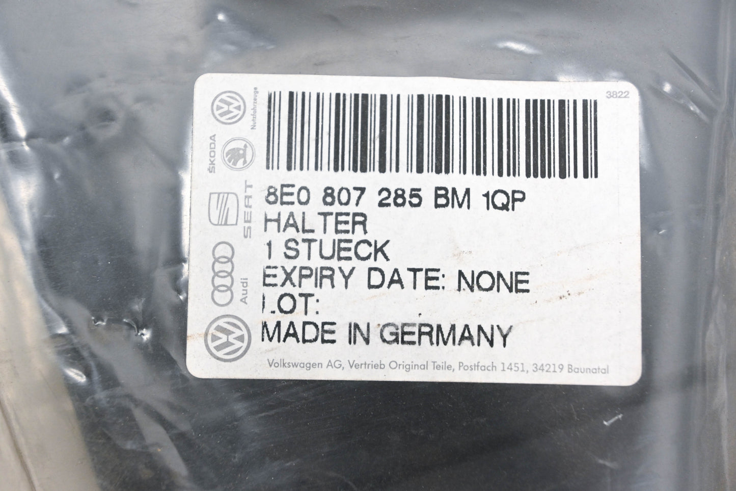 Audi 8E0-807-285-BM-1QP Front Bumper License Plate Bracket NOS
