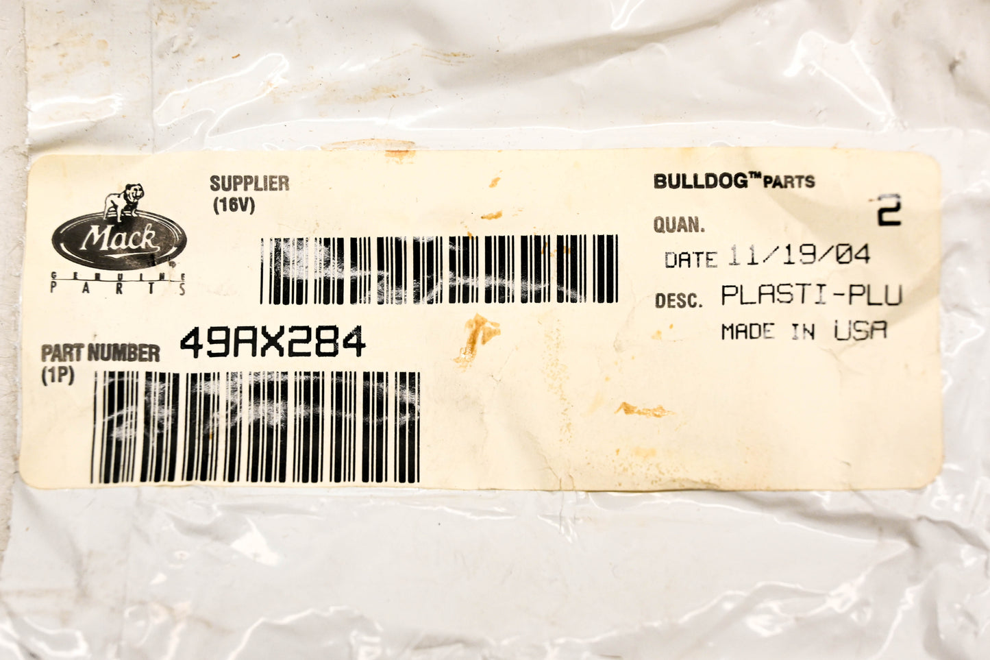 Mack 49AX284 Plastic Plugs Qty 2 NOS