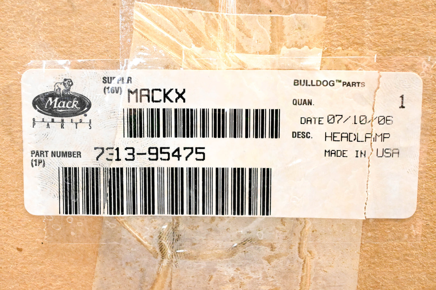 Mack 7313-95475 Headlight Bezel NOS