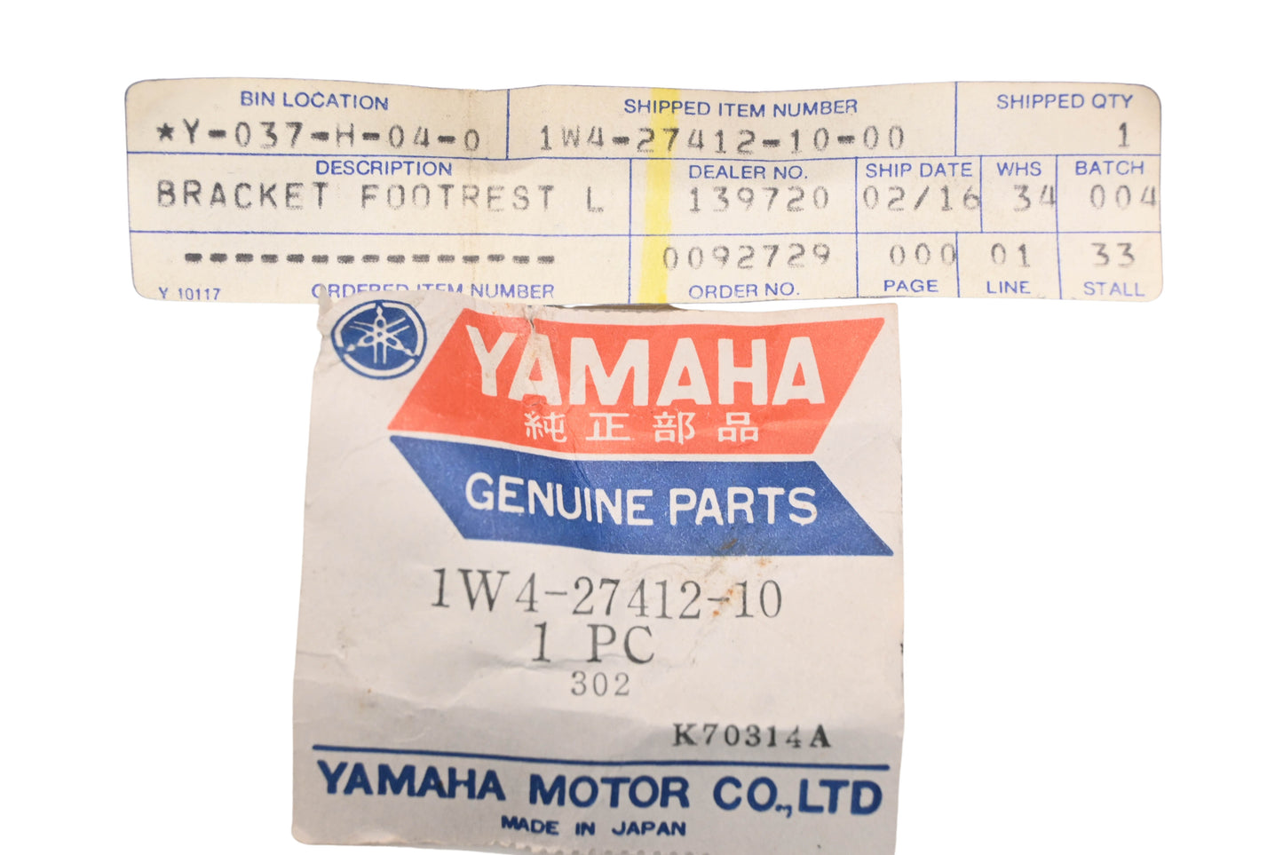 New OEM Yamaha 1W4-27412-10-00 Footrest Bracket NOS