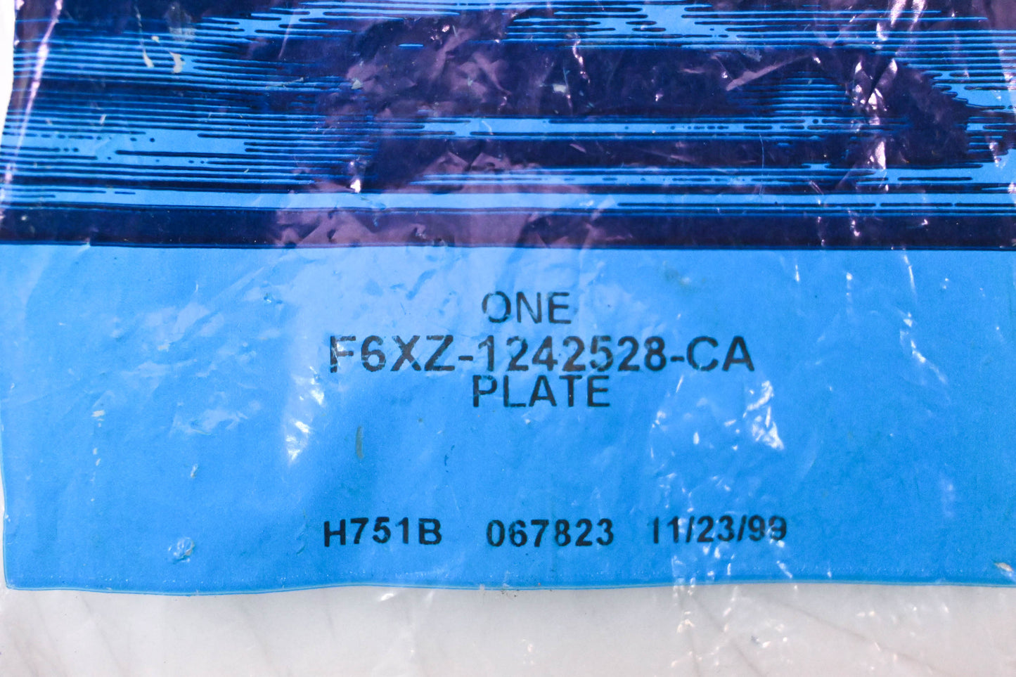 New OEM Ford F6XZ-1242528-CA Mercury Emblem Nameplate NOS