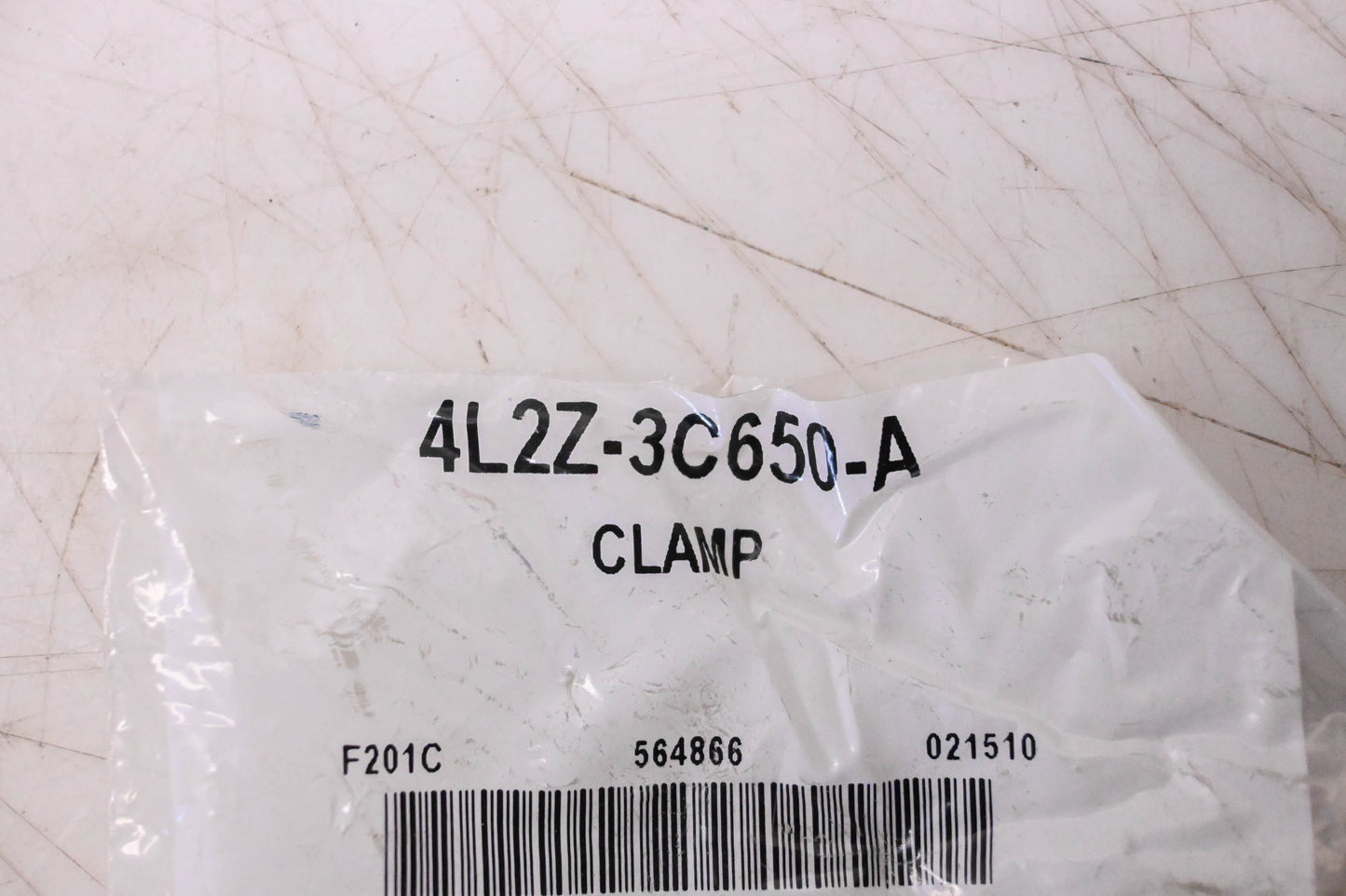 New OEM Ford 4L2Z-3C650-A Clamp NOS