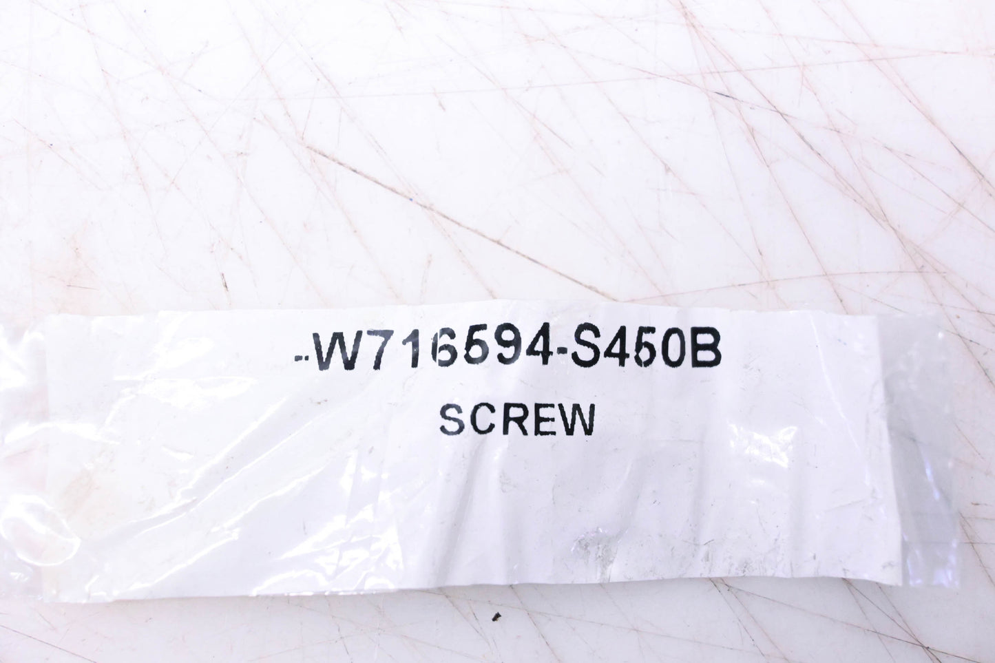 New OEM Ford W716594-S450B Applique Screw NOS