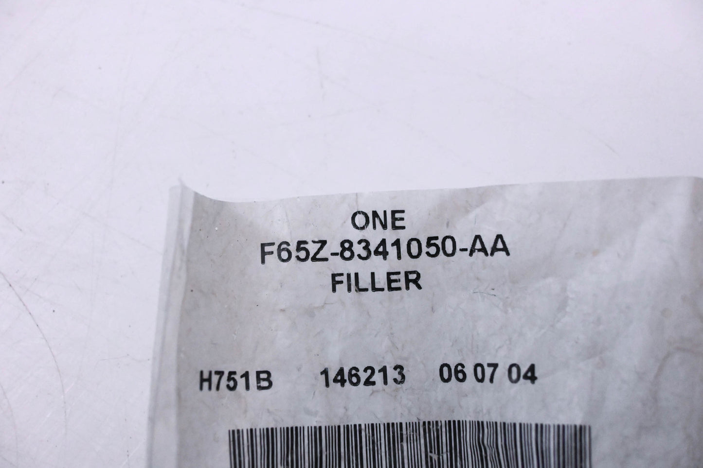 New OEM Ford F65Z-8341050-AA Lower Filler NOS