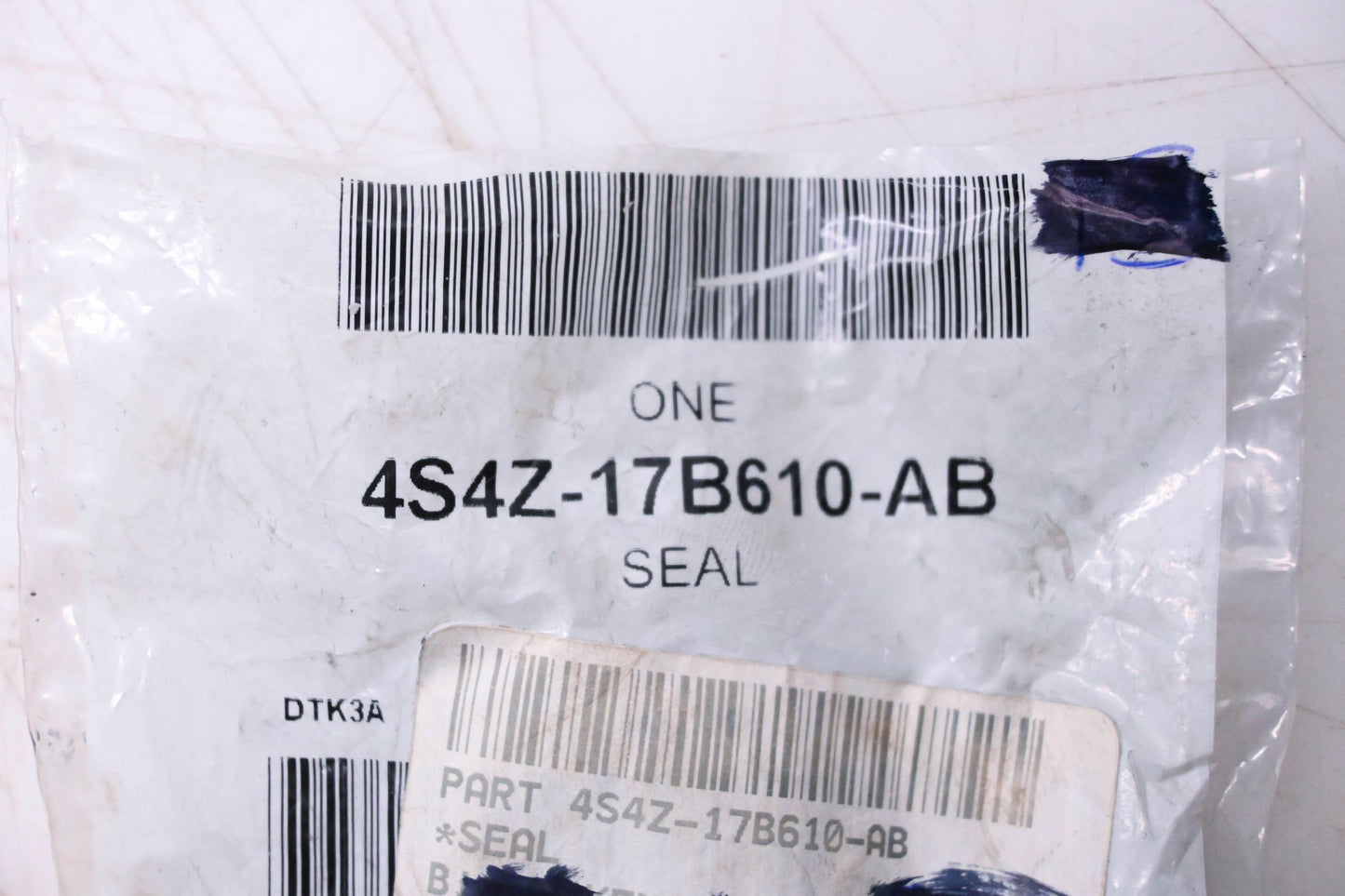 New OEM Ford 4S4Z-17B610-AB Seal NOS