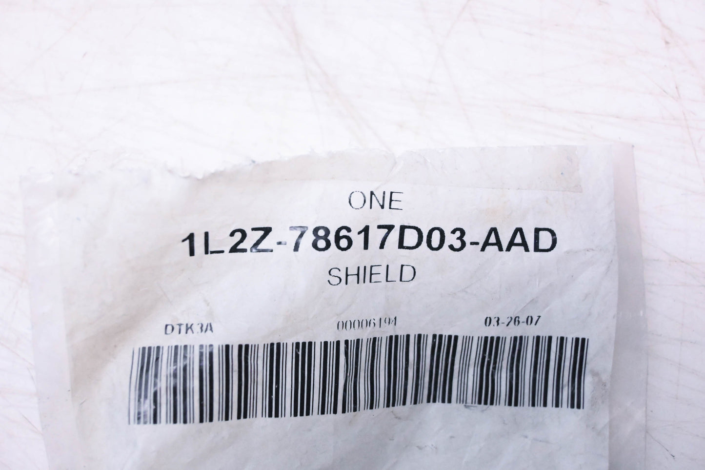 New OEM Ford 1L2Z-78617D03-AAD Shield NOS