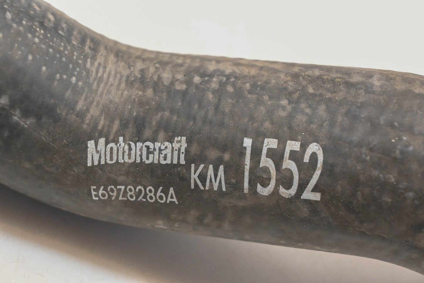 New OEM Motorcraft KM-1552, E69Z-8286-A, KM1552 Coolant Hose NOS