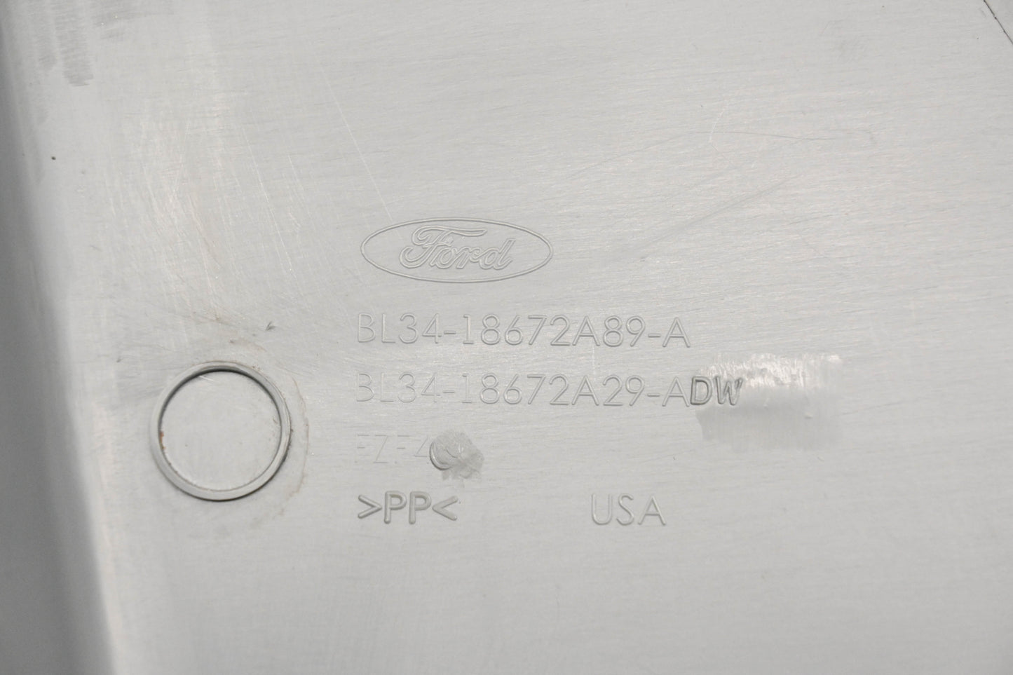 New OEM Ford BL34-18672A89-A, BL34-18672A29-ADW Center Bench Seat Lower Lefthand Trim Cover NOS