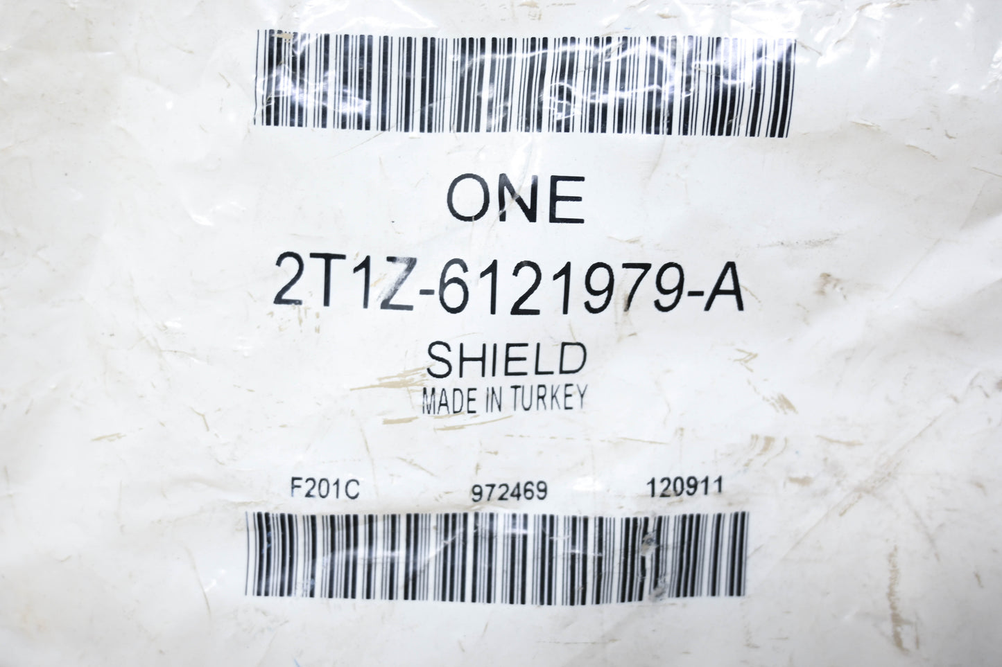 New OEM Ford 2T1Z-6121979-A Door Lock Shield NOS