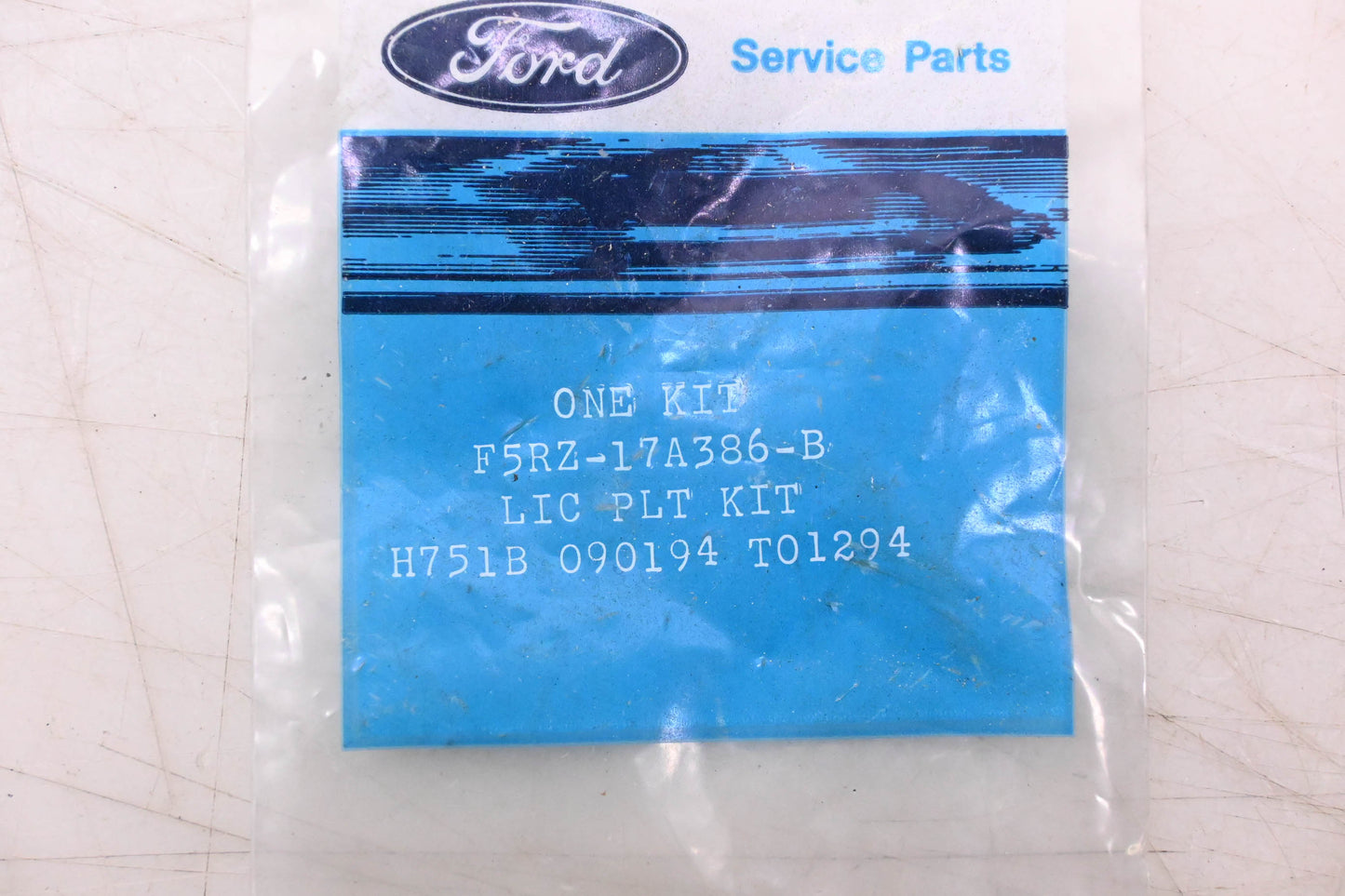 New OEM Ford F5RZ-17A386-B License Plate Bracket Mount Kit NOS