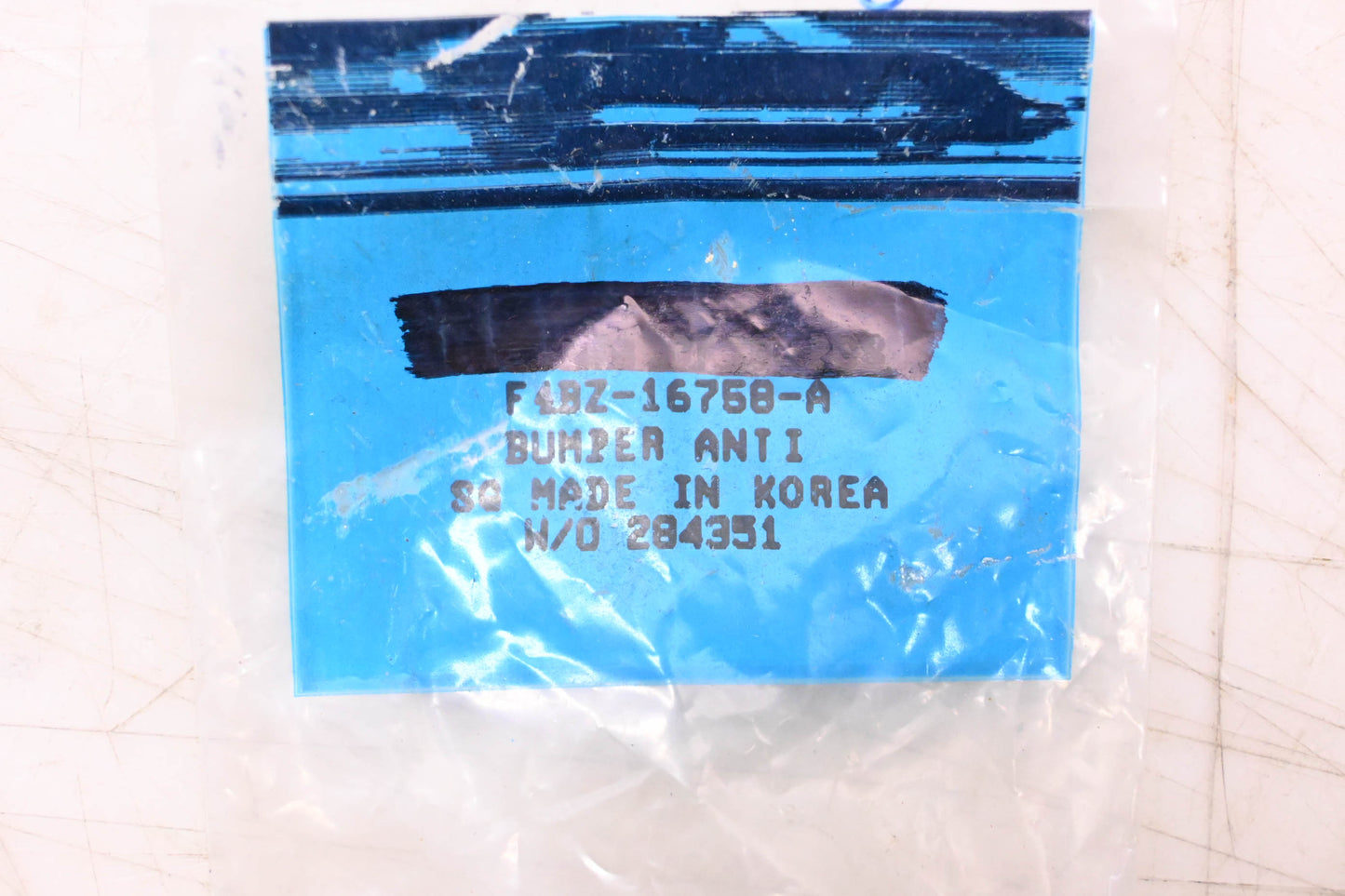 New OEM Ford F4BZ-16758-A Under Hood Bumper NOS