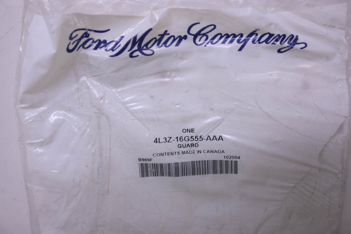 New OEM Ford 4L3Z-16G555-AAA, 4L34-16B569-ACW Front Splash Guard NOS