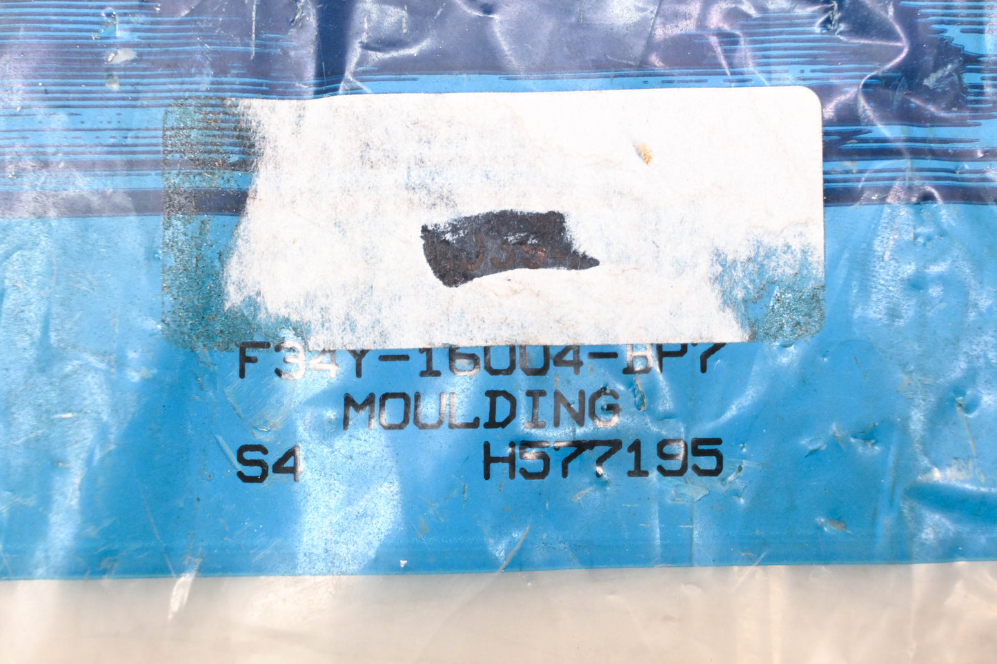 New OEM Ford F34Y-16004-BP7 Green Front Fender Moulding NOS