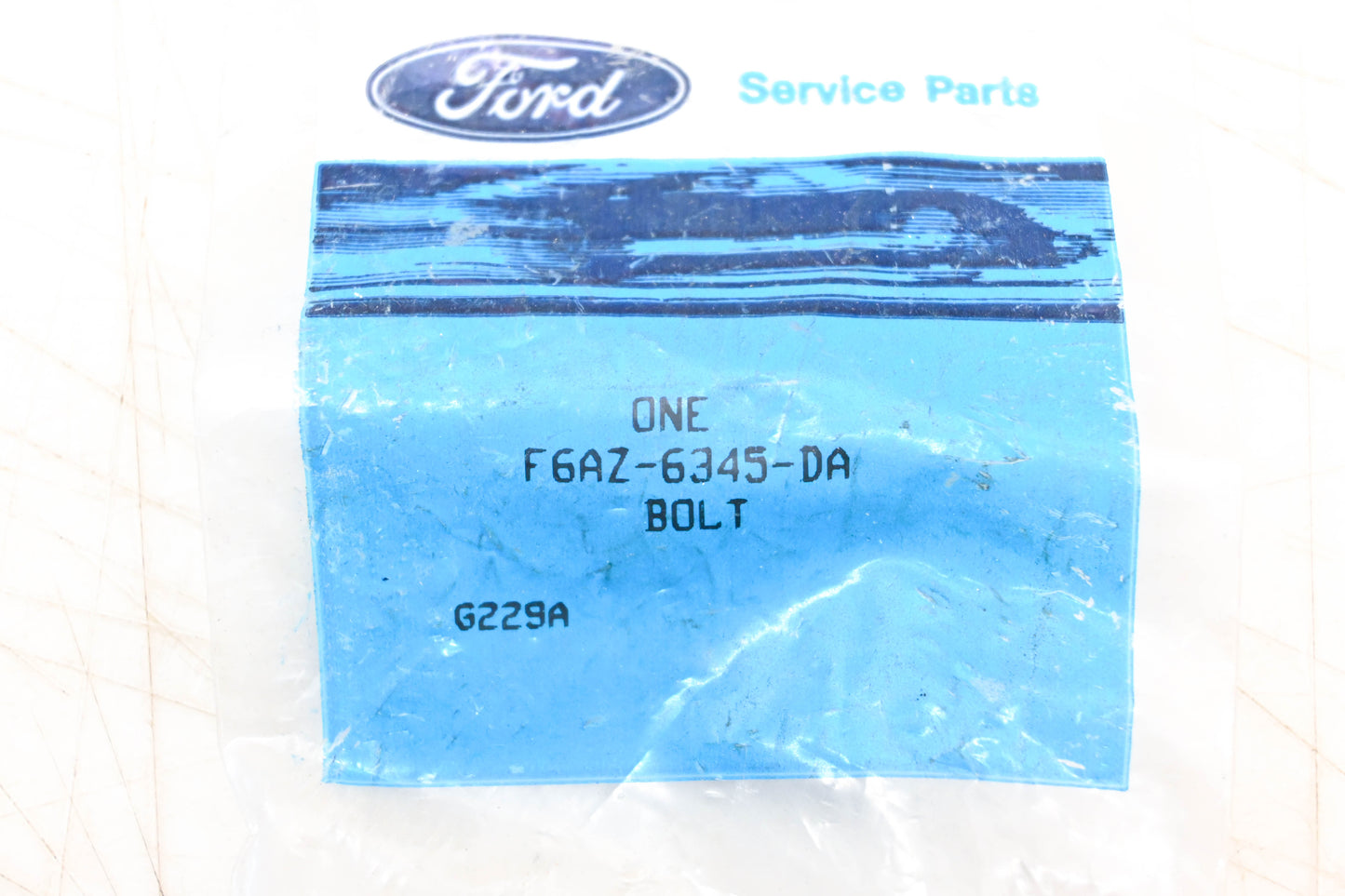 New OEM Ford F6AZ-6345-DA Crankshaft Bolt NOS