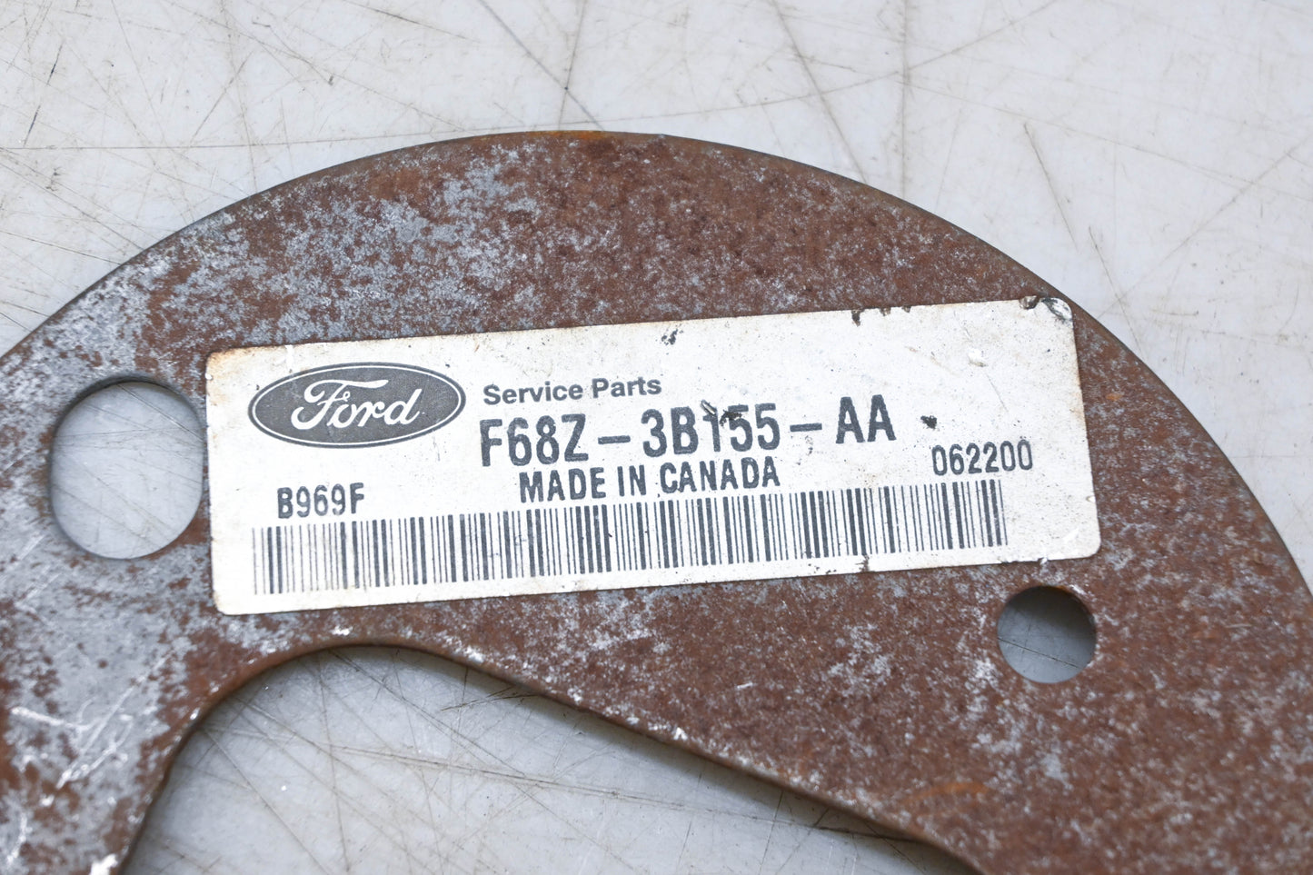 New OEM Ford F68Z-3B155-AA Fender to Shock Housing Plate NOS