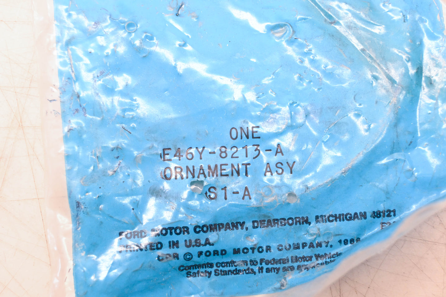 New OEM Ford E46Y-8213-A Mercury Topaz Grill Emblem NOS