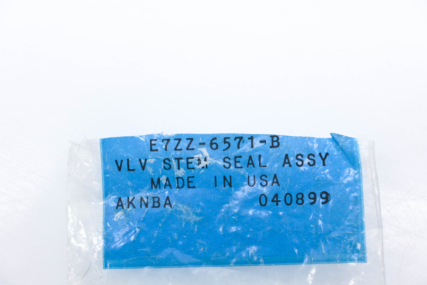 New OEM Ford E7ZZ-6571-B Exhaust Valve Stem Oil Seals Qty 4 NOS