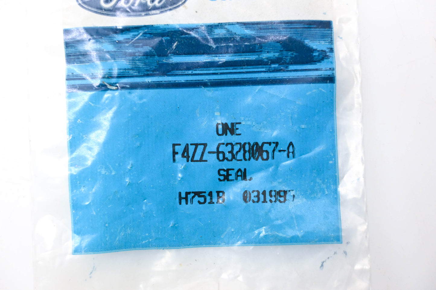 New OEM Ford F4ZZ-6328067-A Seal NOS