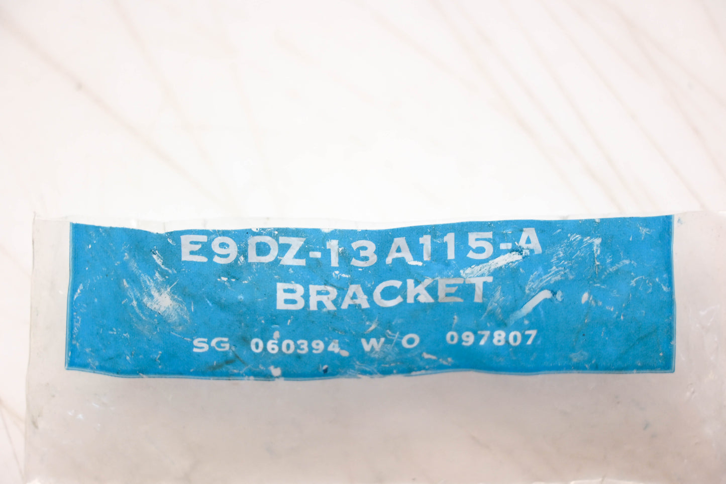 New OEM Ford E9DZ-13A115-A Left Side Upper Headlamp Bracket NOS