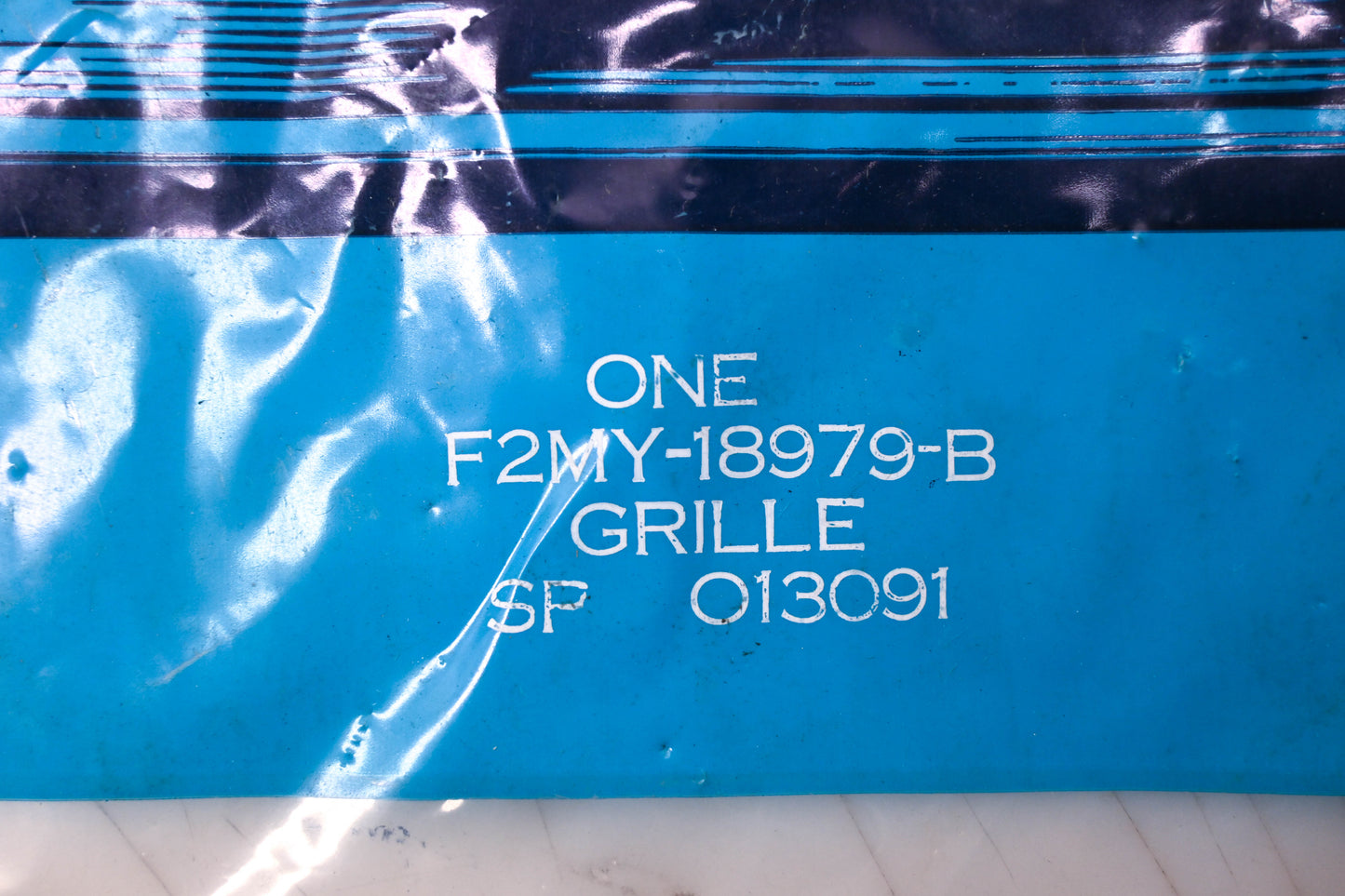 New OEM Ford F2MY-18979-B Grille NOS