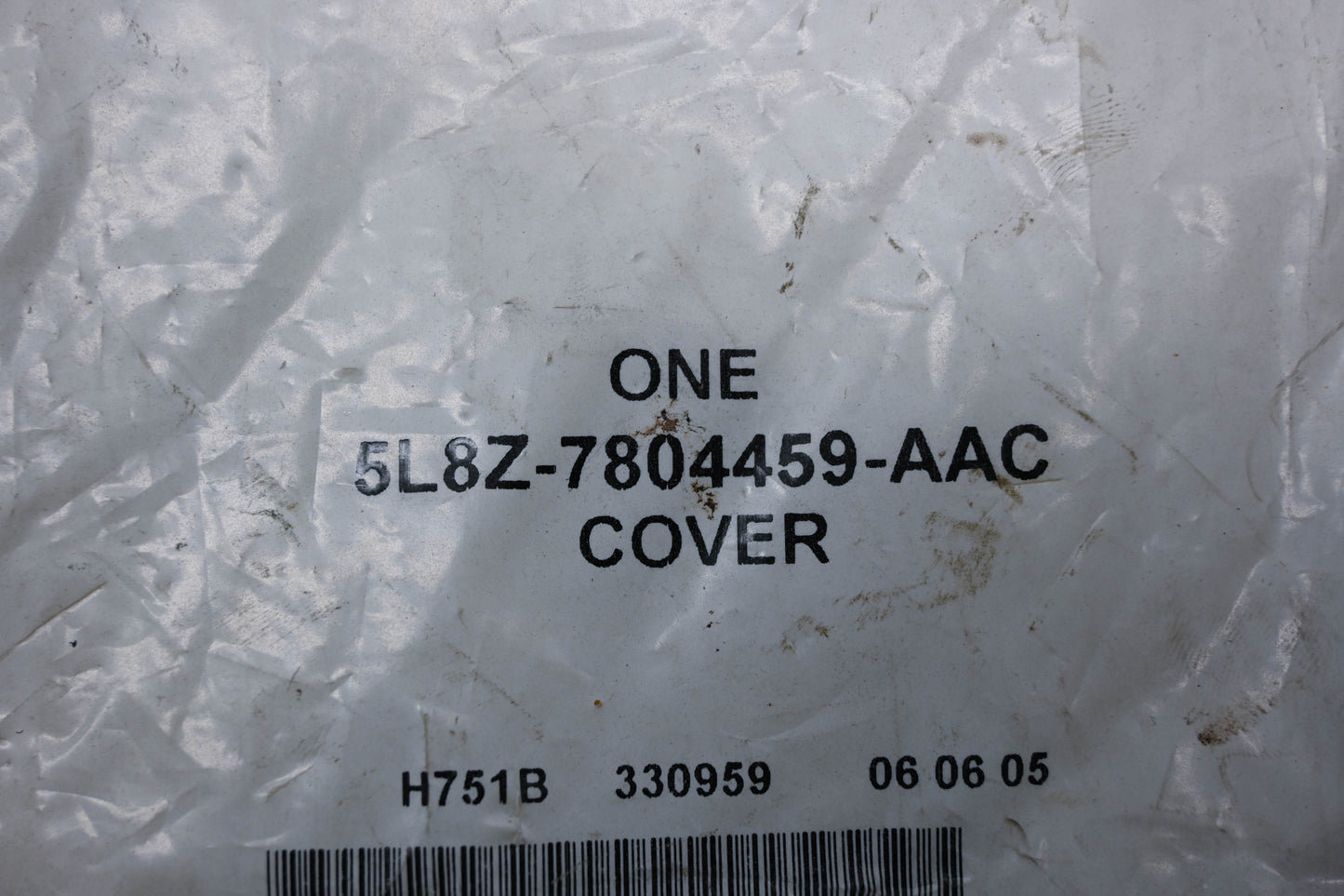New OEM Ford 5L8Z-7804459-AAC Cover Assembly NOS