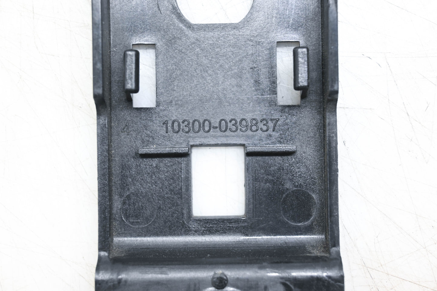 Aftermarket 10300-039837 Black Plastic Bracket NOS