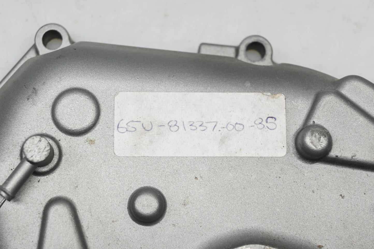 New OEM Yamaha 65U-81337-00-8S Fly Wheel Cover NOS