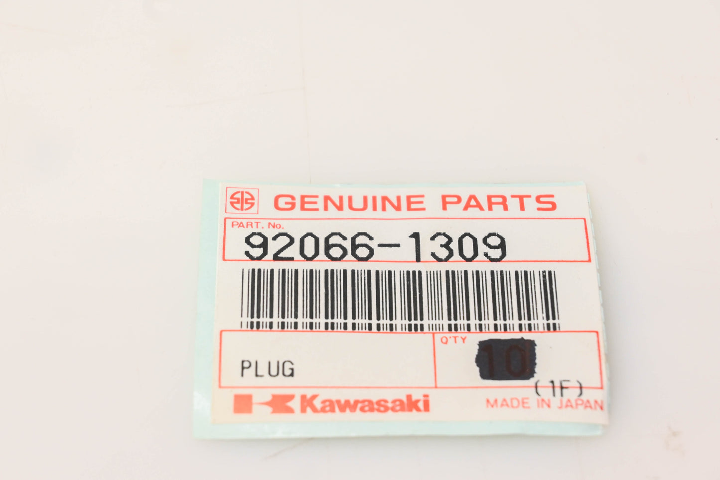 New OEM Kawasaki 92066-1309 Plug NOS
