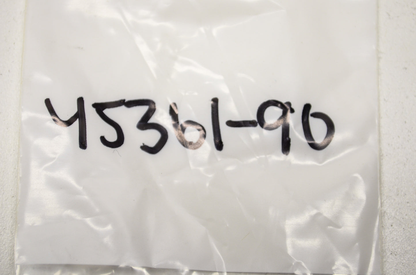 Oil Lock Piece NOS