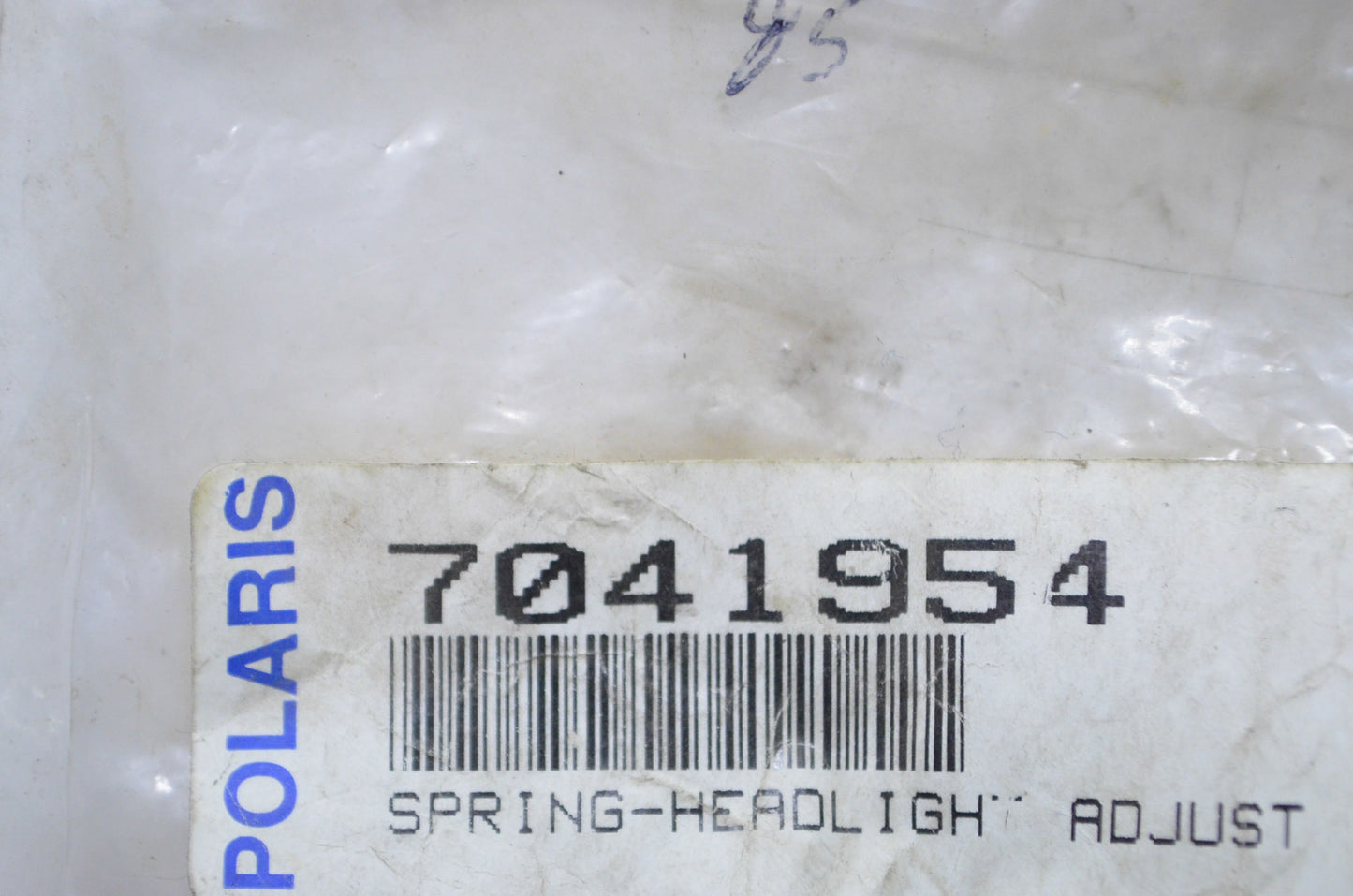 New OEM Polaris Headlight Adjuster Spring NOS