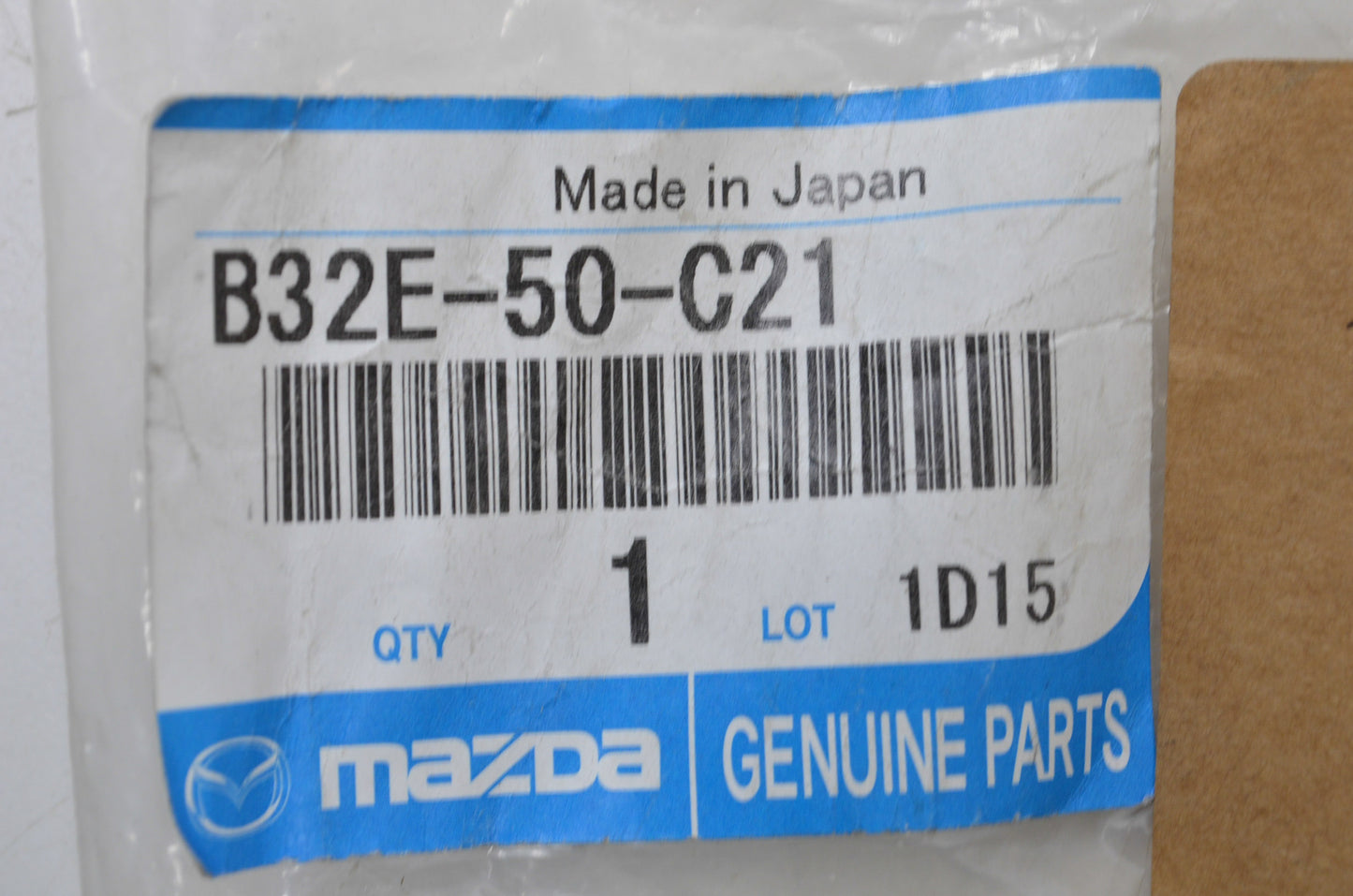 New OEM Mazda Left Headlight Lamp Cover NOS