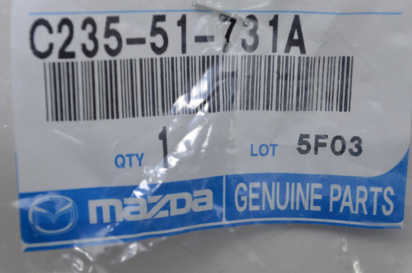New OEM Mazda Front Grille Emblem Ornament NOS