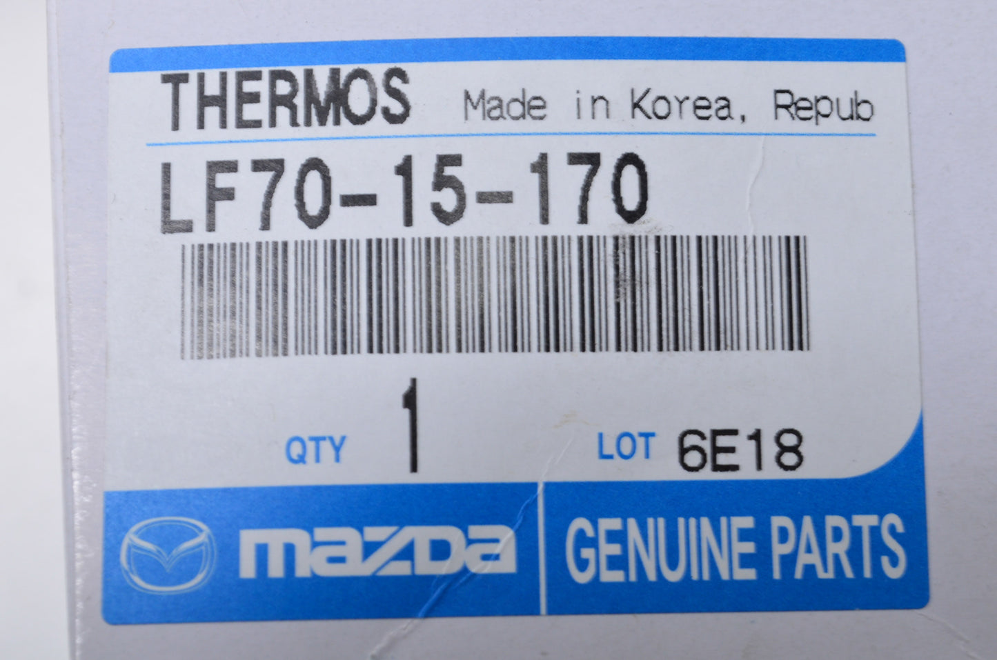 New OEM Mazda Thermostat Housing Assembly NOS