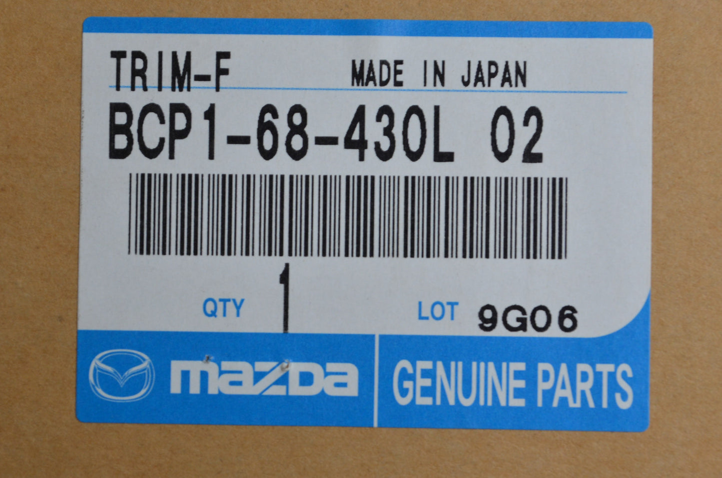 OEM Mazda BCP1-68-430L-02 Black Passenger Sid Door Trim Panel NOS