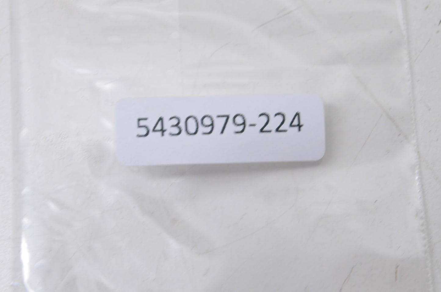 OEM Polaris 5430979-224 Black/Purple Bumper Emblem NOS