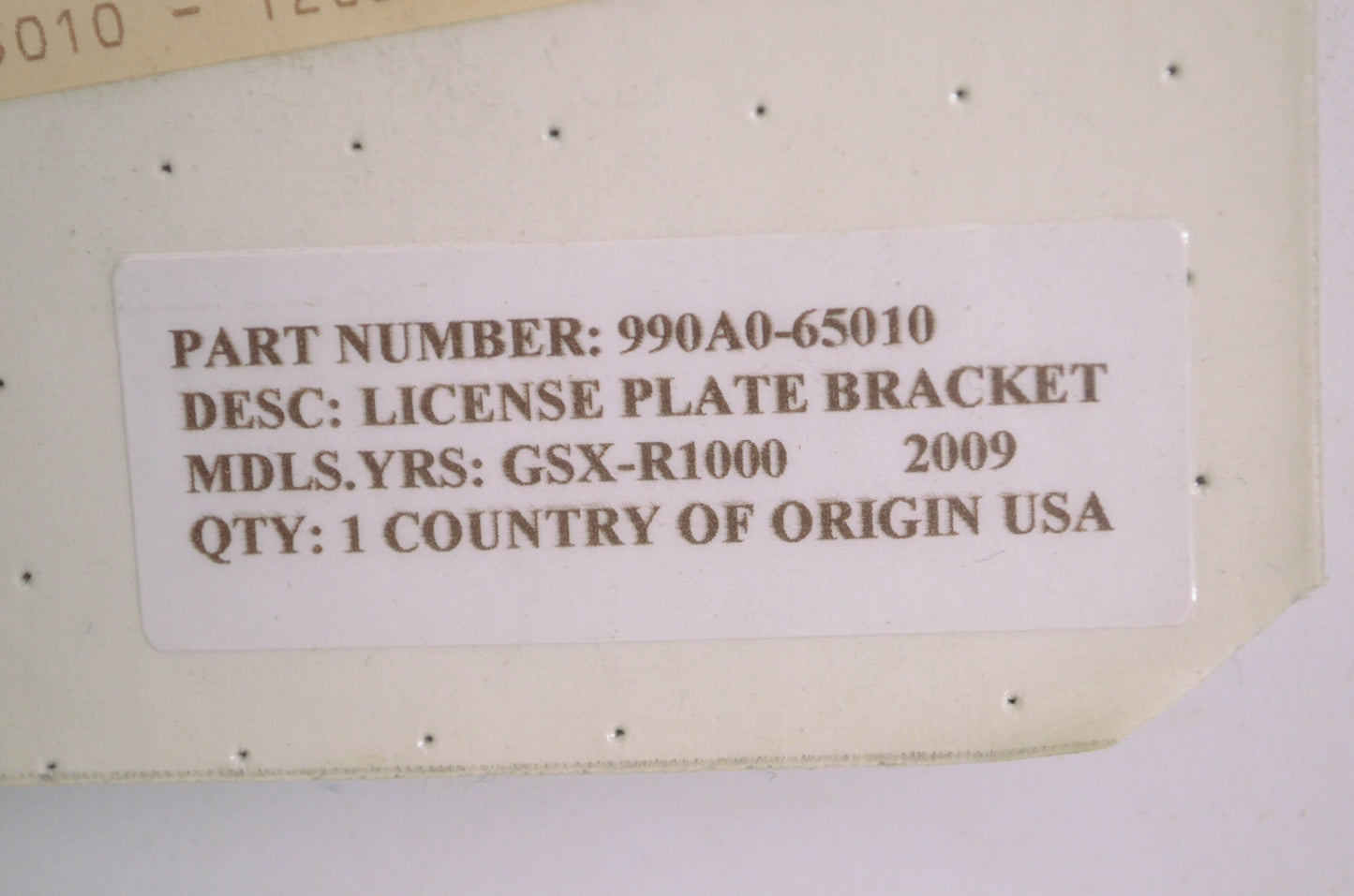 OEM Suzuki 990A0-65010 License Plate Bracket NOS