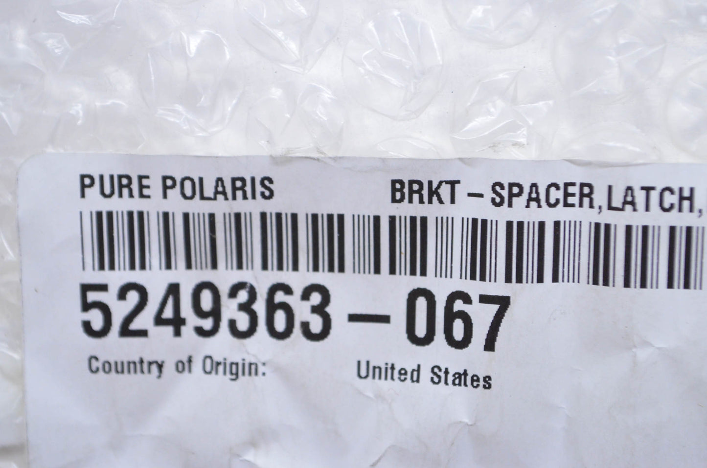OEM Polaris 5249363-067 Black Latch Spacer Bracket NOS