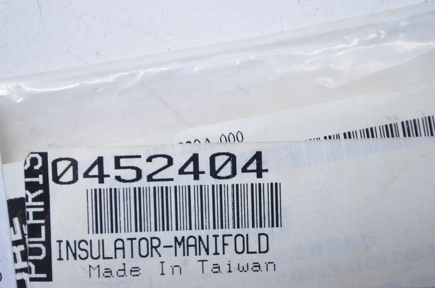 OEM Polaris 452404 Manifold Insulator NOS