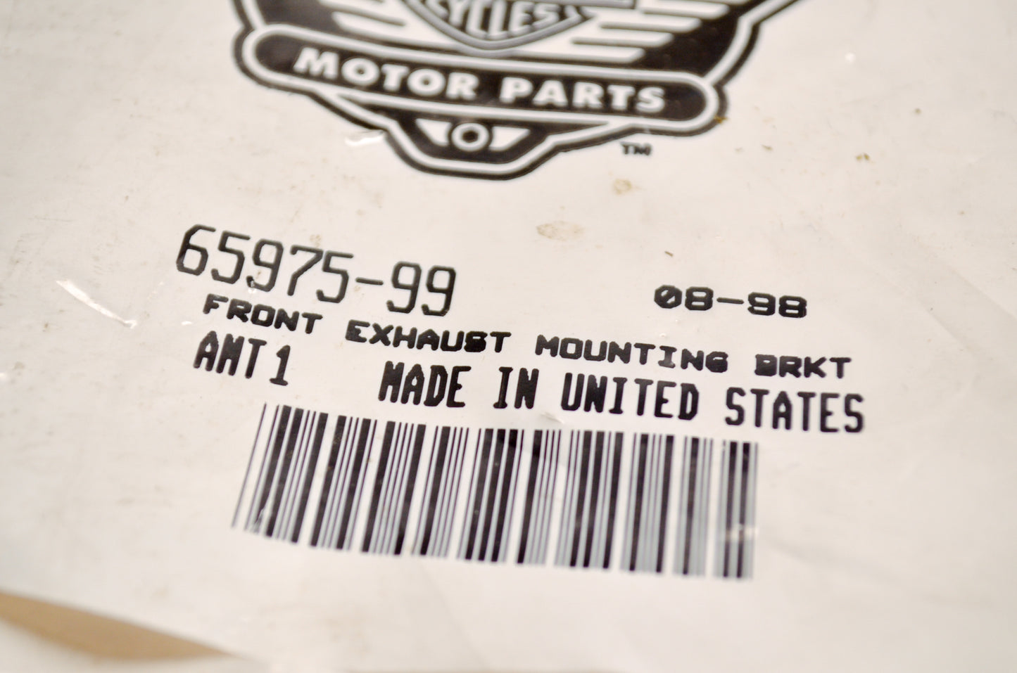 OEM Harley-Davidson 65975-99 Front Exhaust Mounting Bracket NOS